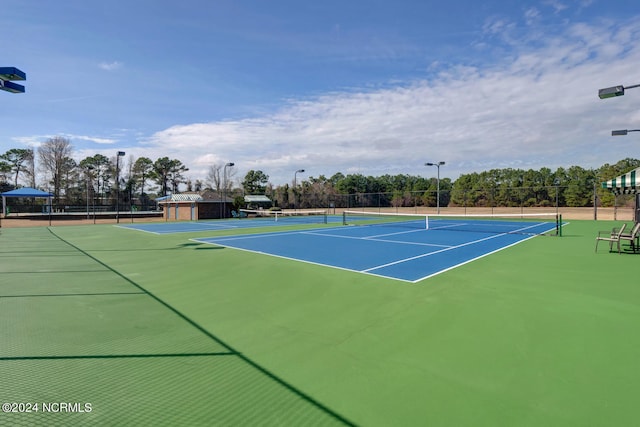 view of sport court featuring basketball court