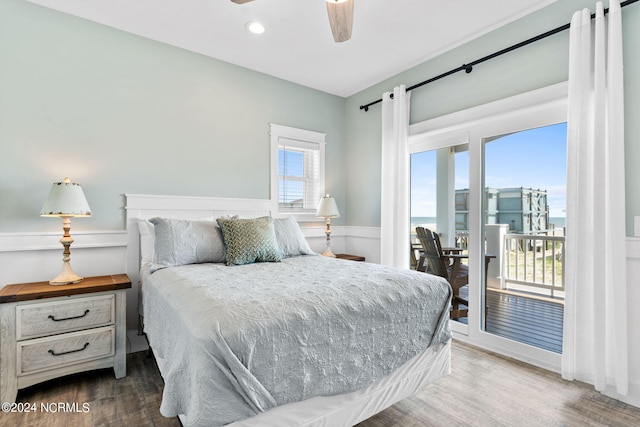 445 E Third St, Ocean Isle Beach, NC 28469 - bedroom featuring access to exterior, wood finished floors, ceiling fan, and recessed lighting