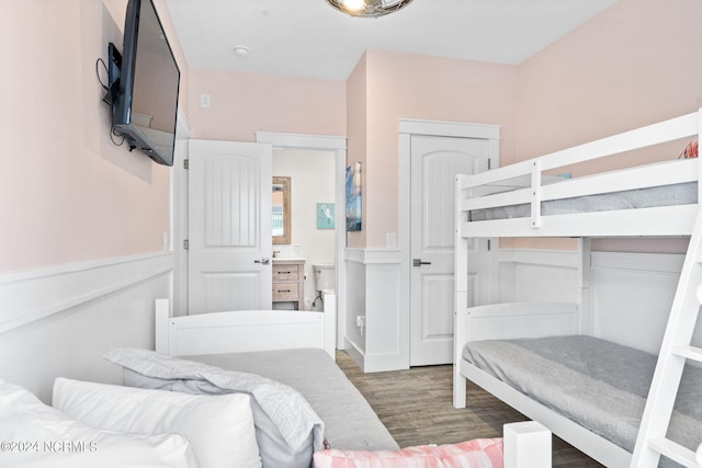 445 E Third St, Ocean Isle Beach, NC 28469 - bedroom featuring wood finished floors