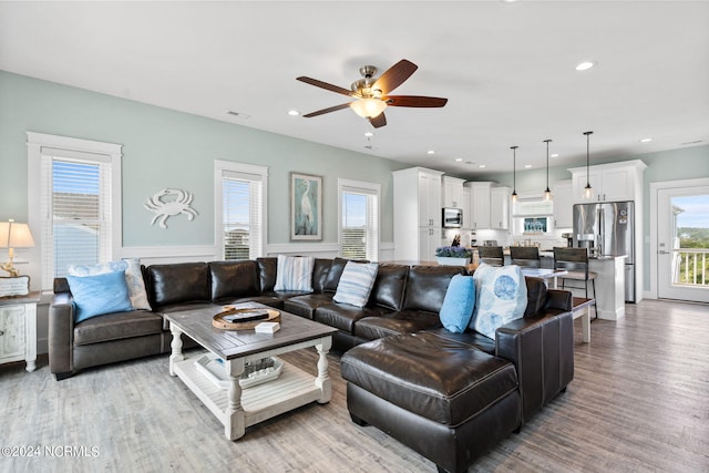 445 E Third St, Ocean Isle Beach, NC 28469 - living area with ceiling fan, light wood finished floors, and recessed lighting