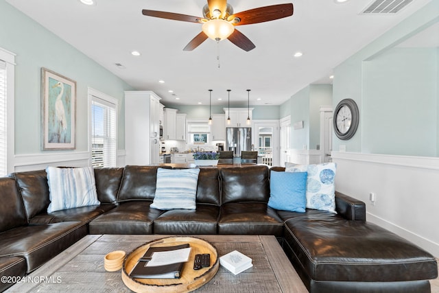445 E Third St, Ocean Isle Beach, NC 28469 - living area featuring ceiling fan and recessed lighting