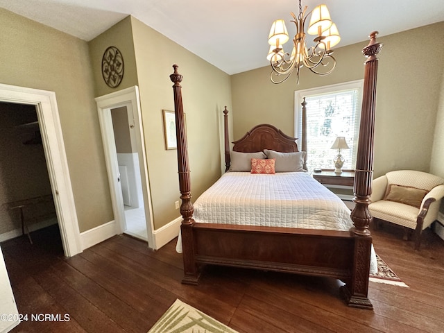 bedroom with baseboards, a chandelier, and dark wood-type flooring