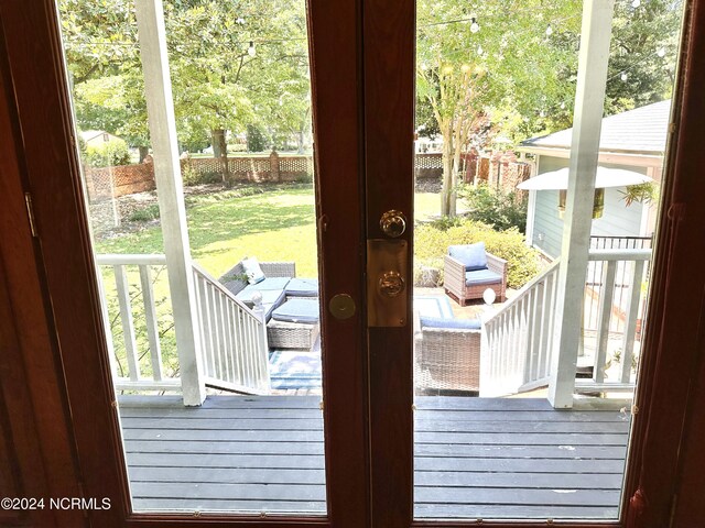 doorway to outside featuring french doors and a wealth of natural light