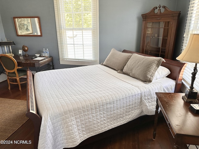 bedroom with wood finished floors