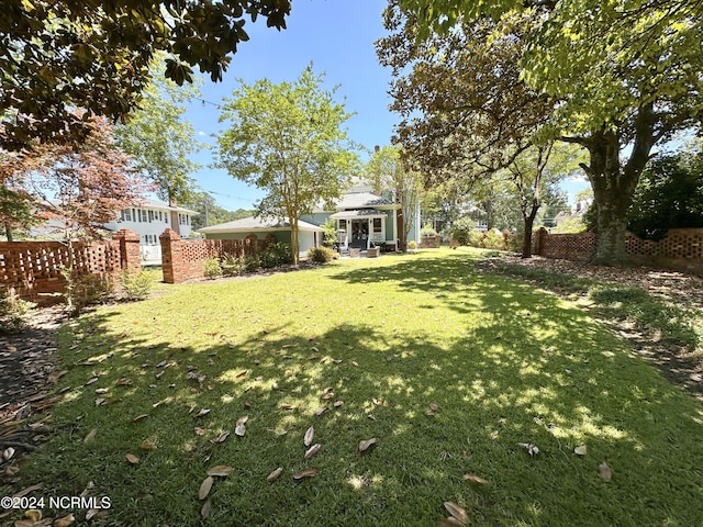 view of yard featuring fence