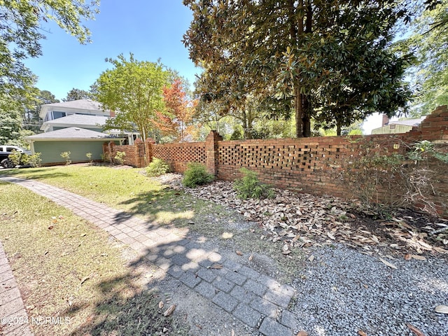 view of yard with fence