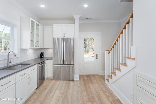 112 Seagate Pl, Wilmington, NC 28403 - kitchen with stainless steel appliances, a sink, dark countertops, healthy amount of natural light, and recessed lighting