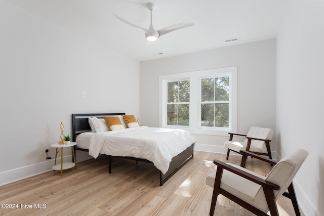 112 Seagate Pl, Wilmington, NC 28403 - bedroom featuring light wood-style floors, baseboards, and ceiling fan