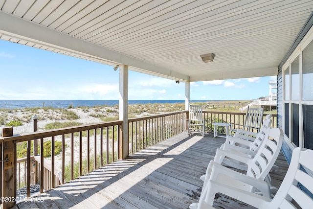 deck featuring a water view