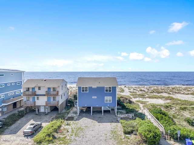 drone / aerial view with a view of the beach and a water view