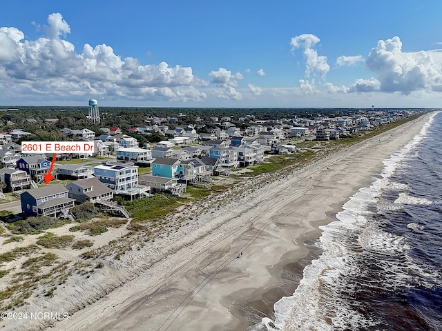 drone / aerial view with a view of the beach and a water view