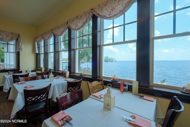 dining space with a water view