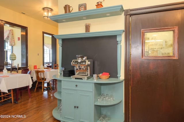 kitchen with dark hardwood / wood-style floors