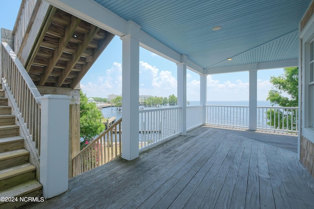 deck featuring a water view