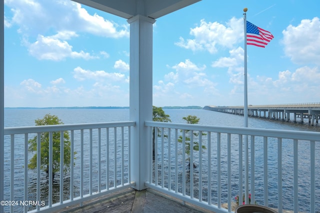 balcony featuring a water view