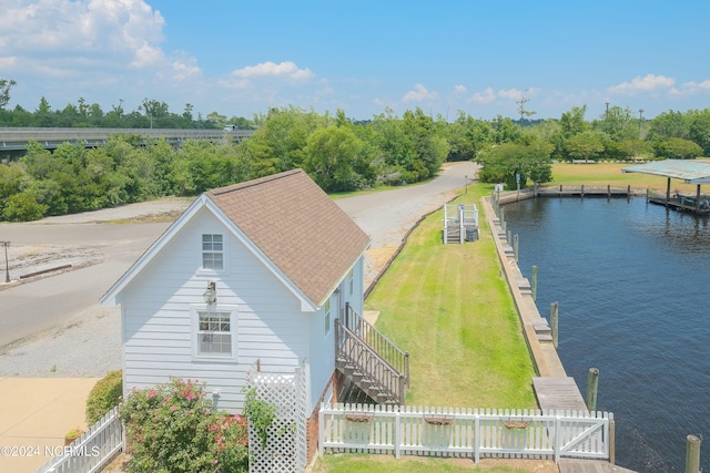 drone / aerial view featuring a water view