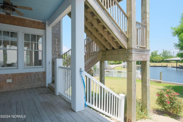 108 Wharf Landing Dr, Edenton, NC 27932 - wooden terrace with stairs, a water view, ceiling fan, and a yard