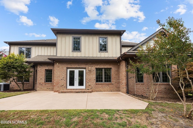 back of house featuring french doors, cooling unit, and a patio