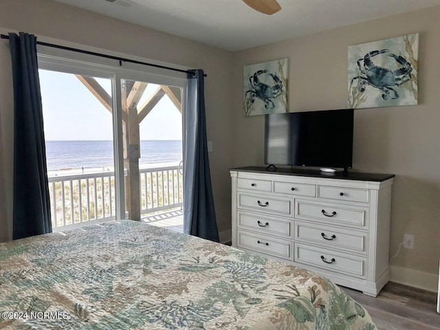 bedroom with access to exterior, ceiling fan, baseboards, and wood finished floors