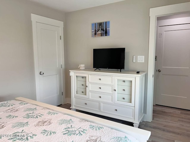 bedroom with light wood-style flooring