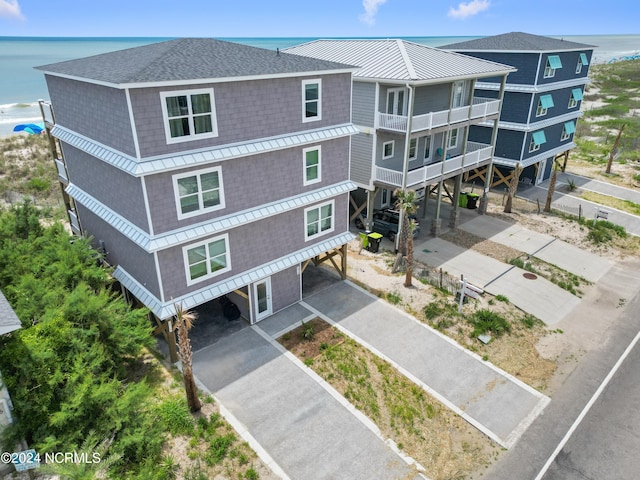 view of building exterior with a water view