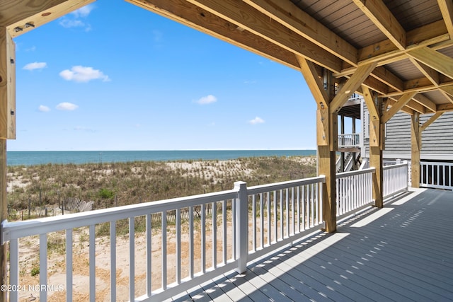 deck featuring a water view