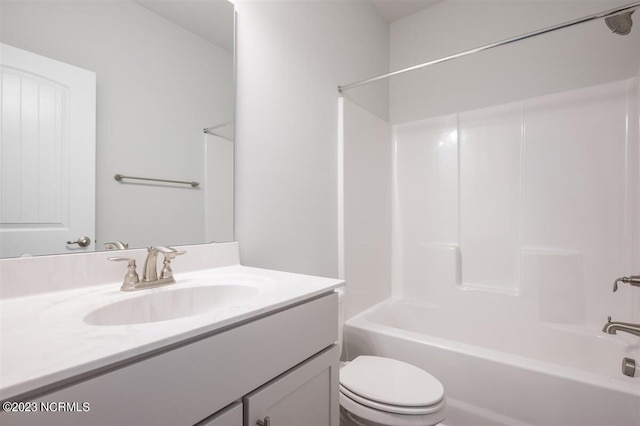 full bathroom featuring vanity, toilet, and bathing tub / shower combination