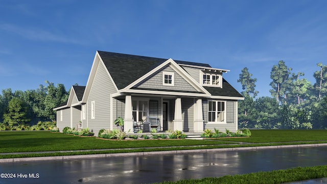 craftsman-style house with covered porch and a front yard