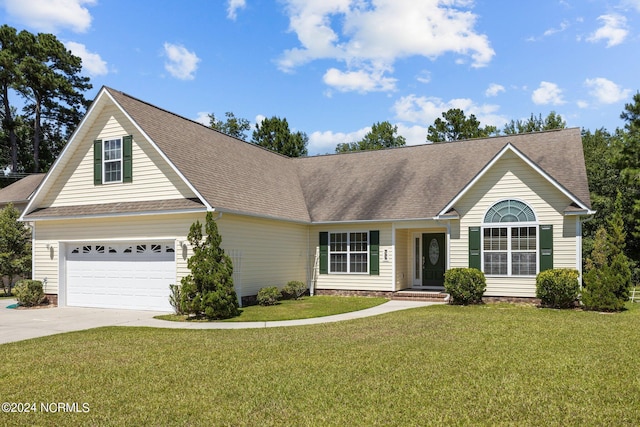 view of front facade featuring a garage and a front yard