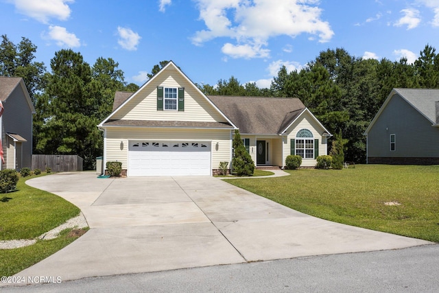 view of front facade featuring a garage and a front yard