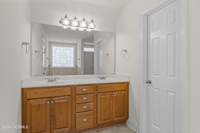 bathroom with vanity and tile patterned floors