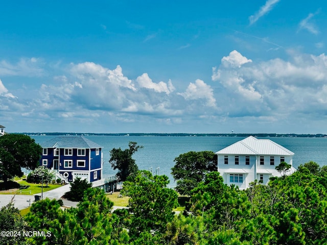 exterior space with a water view