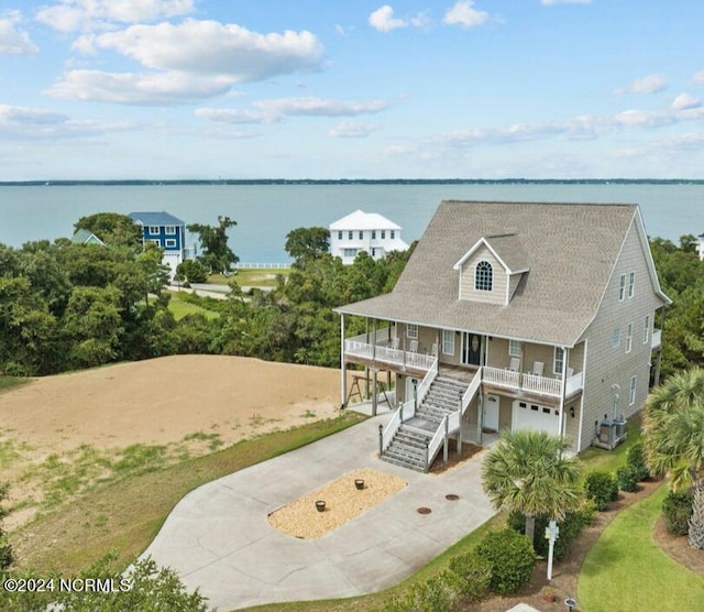 aerial view featuring a water view