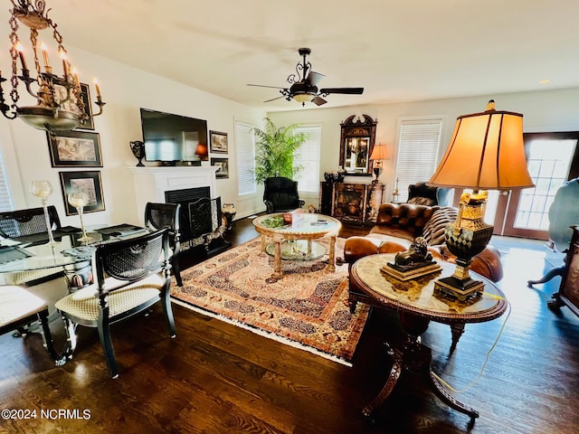 living room featuring ceiling fan and hardwood / wood-style floors