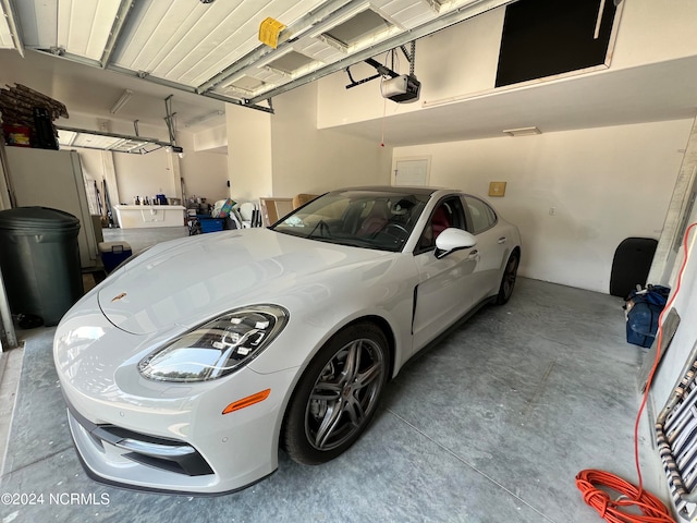 garage featuring a garage door opener