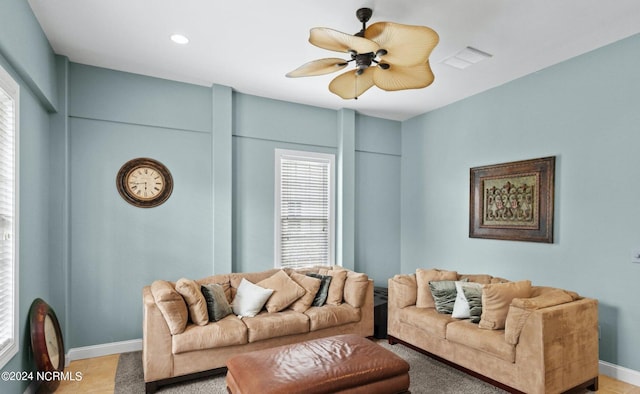 living room featuring ceiling fan