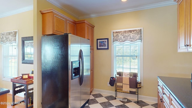 kitchen featuring stainless steel fridge with ice dispenser, ornamental molding, and light tile patterned floors