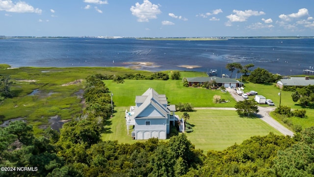 birds eye view of property featuring a water view