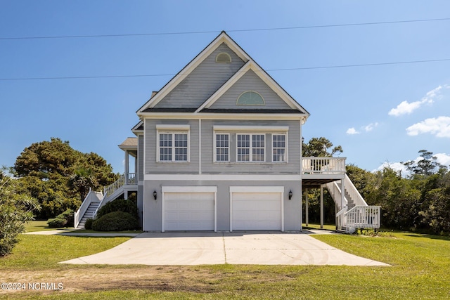 view of front facade featuring a garage and a front lawn