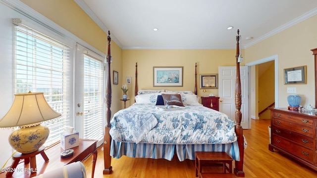 bedroom featuring access to exterior, light wood finished floors, crown molding, and recessed lighting