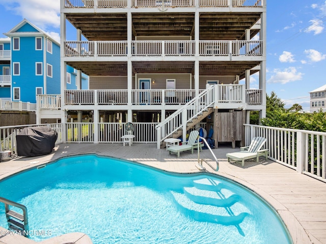 view of pool featuring a deck