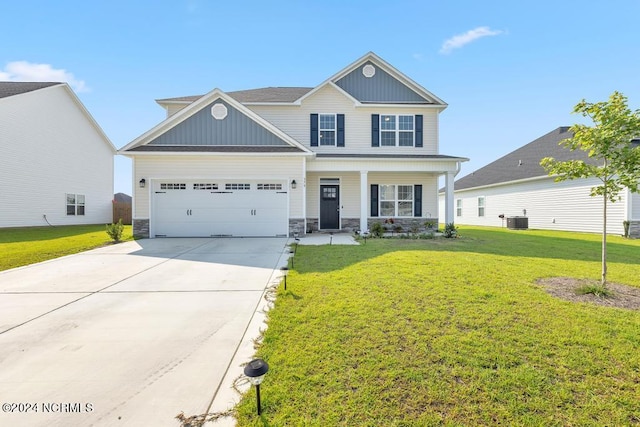 craftsman-style home with a garage, central air condition unit, and a front lawn