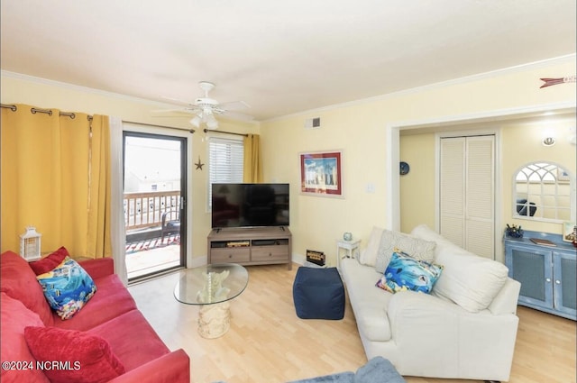 living room with ceiling fan, ornamental molding, and light hardwood / wood-style flooring