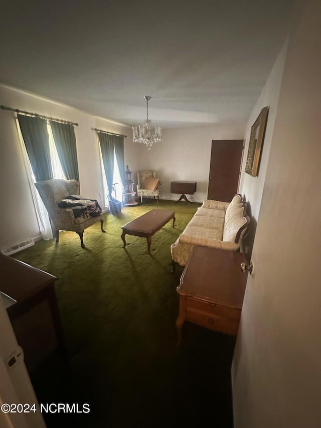 interior space featuring carpet floors and an inviting chandelier