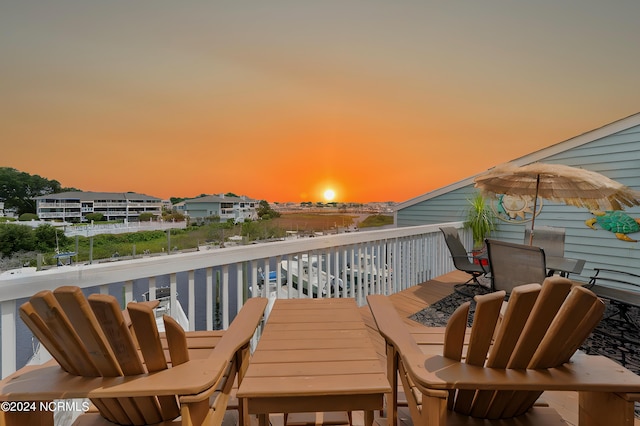 balcony with outdoor dining area