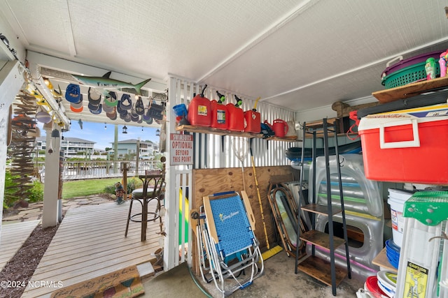 storage area featuring electric water heater