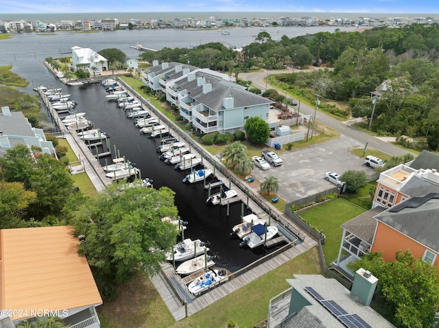 birds eye view of property featuring a water view