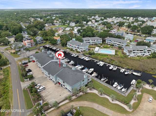 birds eye view of property featuring a water view