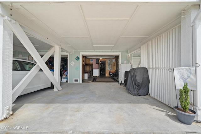 garage with a carport