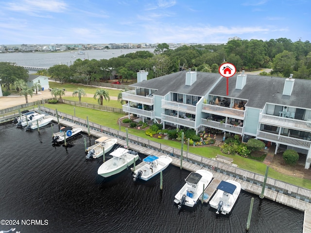 birds eye view of property featuring a water view